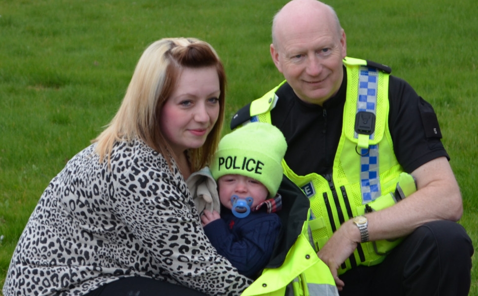 LIFE SAVER: PC Tony Morton with baby Harry and mum Ruth.