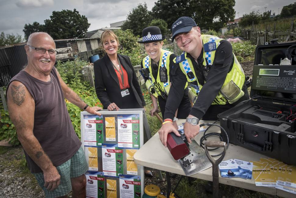 Mary Weastell, Chief Executive of Selby District Council and Police Community Support Officers mark a local resident’s gardening tools using Dot Peen.