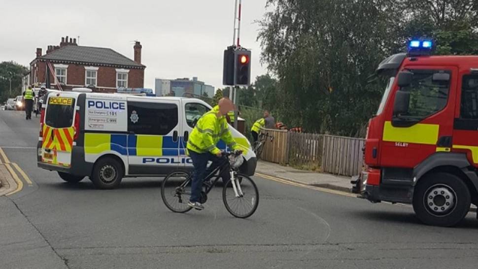 Woman rescued from the water after toll bridge incident.