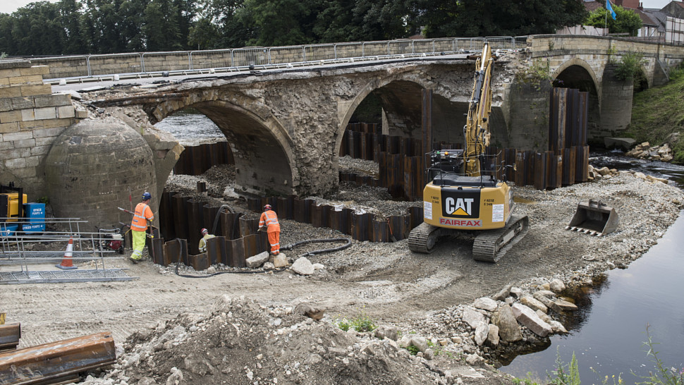 Works to rebuild and widen Tadcaster's troubled river crossing gets going as brewery drops challenge.