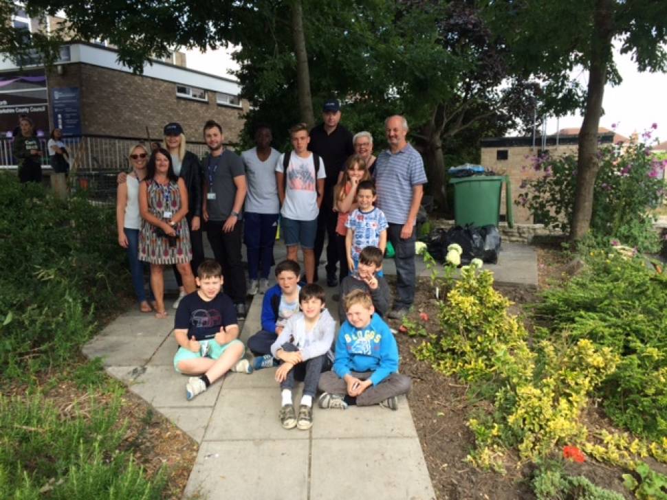 Sherburn's young people help keep village garden neat and tidy