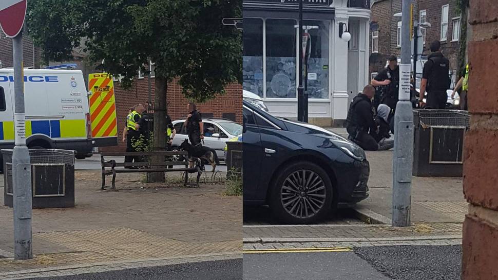 Armed police descend on town centre following 'man with axe' alert
